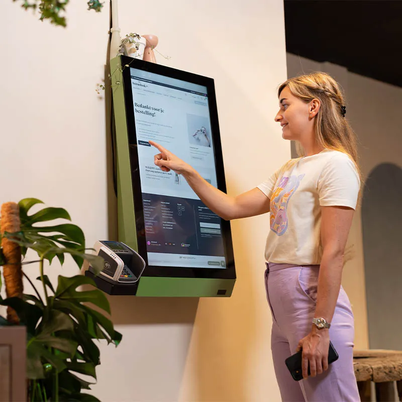 Omnichannel shop-in-shop bestellkiosk Betonlook